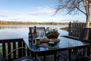 Alfresco dining on the private terrace at Sandmartin Lodge