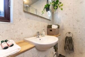 Bathroom vanity at Sandmartin Lodge