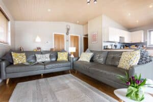 Two leather sofas in the lounge at Keer Lodge