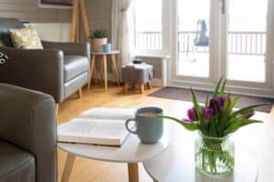Reading corner by the patio doors at Keer Lodge