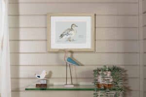 Bird prints and coastal decor in the lounge at Keer Lodge