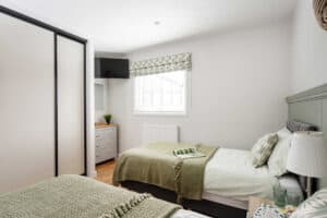 Second bedroom with wardrobe at Keer Lodge